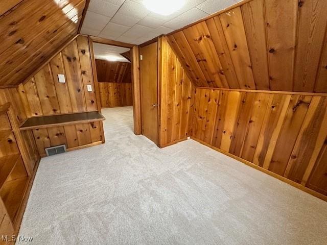 4206 Verona Rd, South Euclid, OH 44121 - bonus room featuring wood walls, carpet, and vaulted ceiling