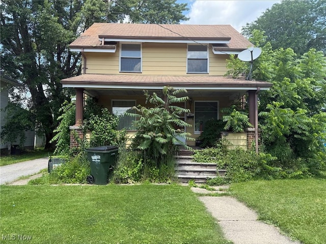 315 Superior St, Newton Falls, OH 44444 - view of front of house with a porch, a front lawn, and a shingled roof