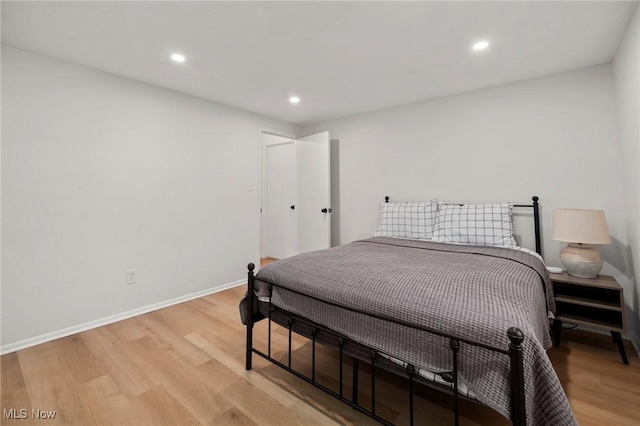 26749 Lake Of The Falls Blvd, Olmsted Falls, OH 44138 - bedroom with light wood-type flooring and recessed lighting