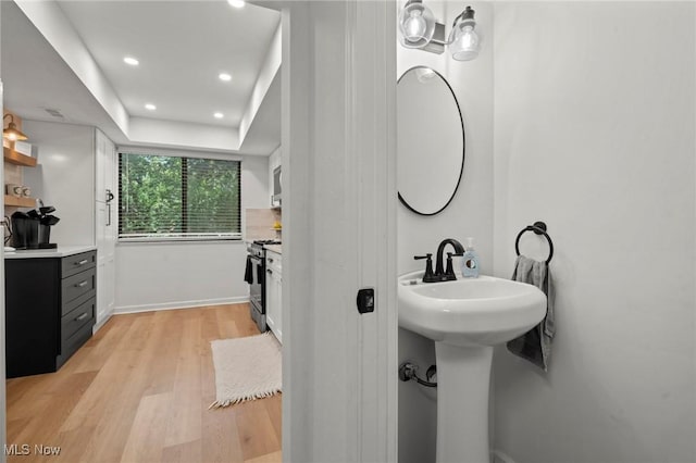 26749 Lake Of The Falls Blvd, Olmsted Falls, OH 44138 - bathroom featuring wood finished floors and recessed lighting