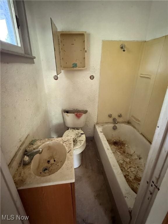 2013 7th St NE, Canton, OH 44704 - full bathroom featuring vanity and toilet
