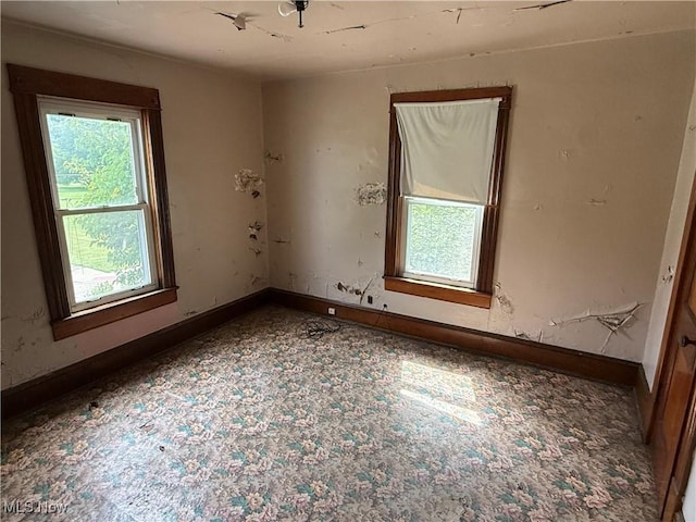 2013 7th St NE, Canton, OH 44704 - spare room with baseboards