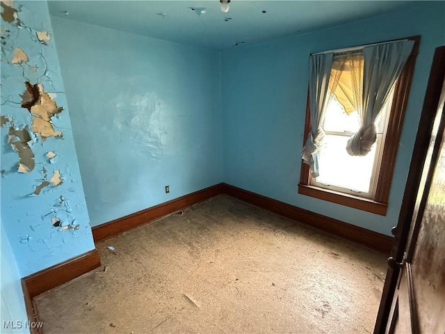 2013 7th St NE, Canton, OH 44704 - spare room with baseboards