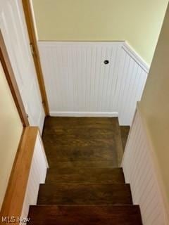1104 Kenmore Ave SE, Warren, OH 44484 - stairway with wainscoting and wood finished floors