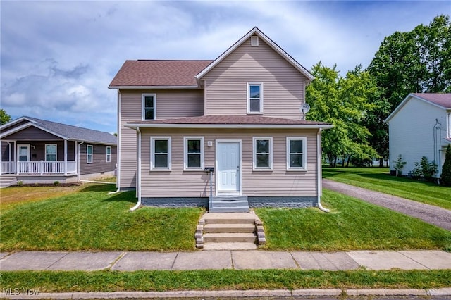 1014 Noble St E, Alliance, OH 44601 - view of front of home with a front lawn