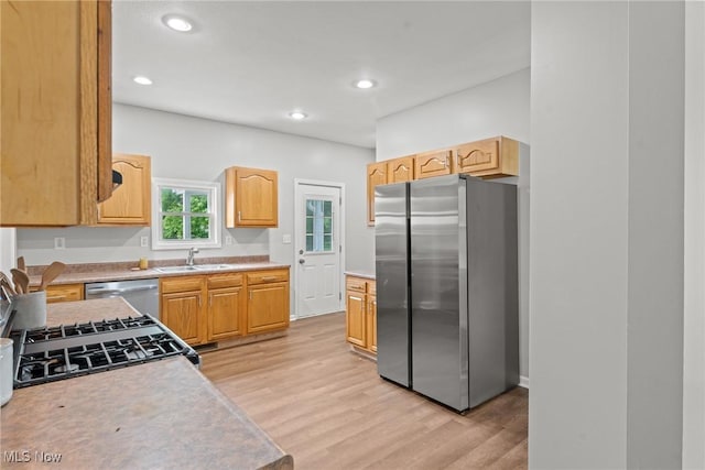 1014 Noble St E, Alliance, OH 44601 - kitchen featuring appliances with stainless steel finishes, light wood-style floors, light countertops, recessed lighting, and light brown cabinets