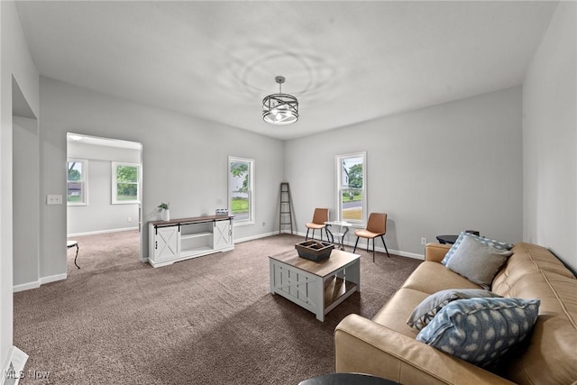 1014 Noble St E, Alliance, OH 44601 - living room with carpet and a chandelier