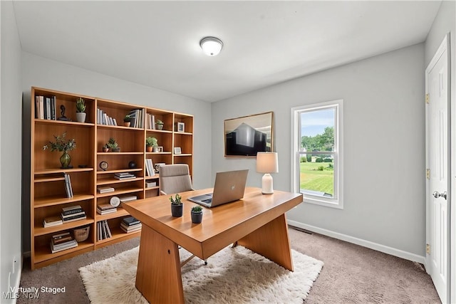 1014 Noble St E, Alliance, OH 44601 - carpeted office space featuring baseboards