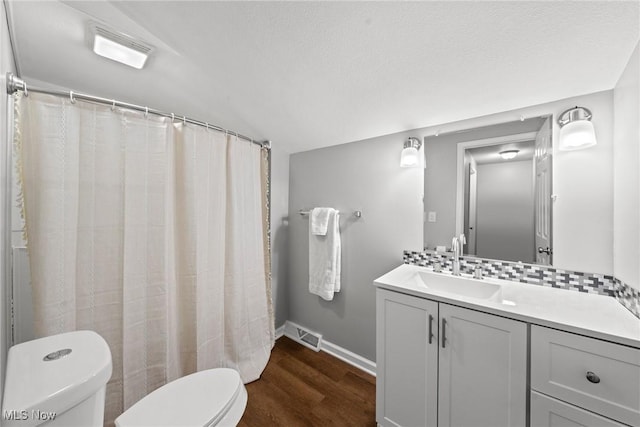 1014 Noble St E, Alliance, OH 44601 - bathroom featuring vanity and wood finished floors