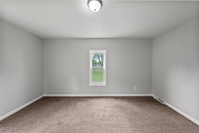 1014 Noble St E, Alliance, OH 44601 - carpeted spare room with baseboards