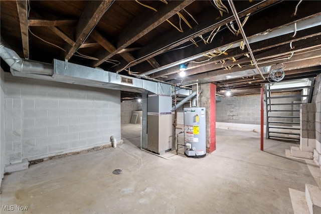 1014 Noble St E, Alliance, OH 44601 - unfinished below grade area with water heater and heating unit