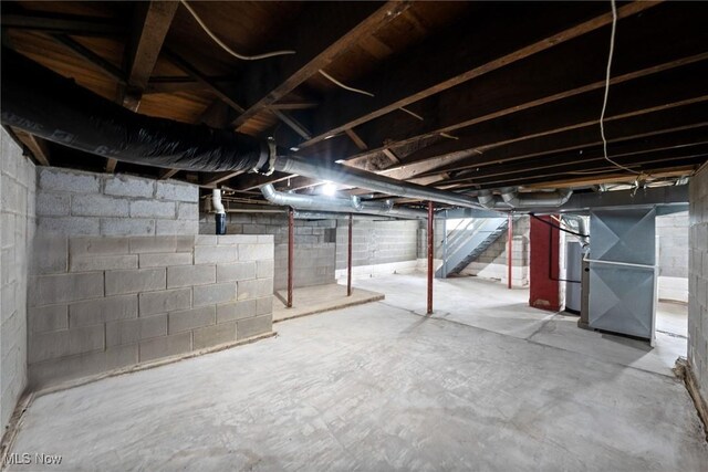 1014 Noble St E, Alliance, OH 44601 - unfinished below grade area featuring stairway