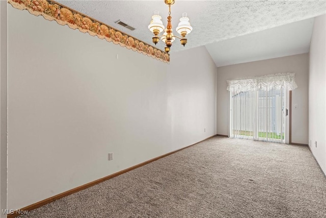 3494 Ivy Hill Cir Unit A, Cortland, OH 44410 - unfurnished room with a chandelier, light carpet, a textured ceiling, and vaulted ceiling