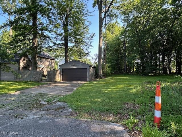 175 Curtis Dr, Avon Lake, OH 44012 - view of yard with an outbuilding and a garage
