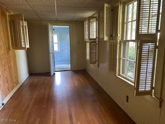 175 Curtis Dr, Avon Lake, OH 44012 - spare room featuring wood finished floors and a paneled ceiling