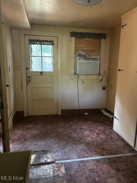 175 Curtis Dr, Avon Lake, OH 44012 - doorway with brick patterned floors and cooling unit