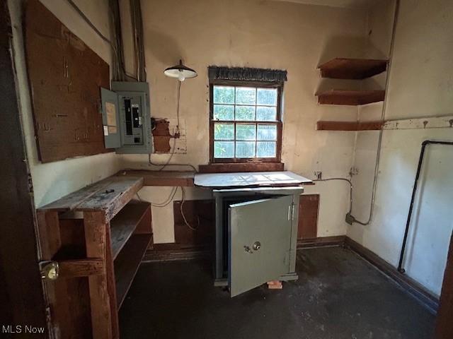 175 Curtis Dr, Avon Lake, OH 44012 - kitchen with electric panel, unfinished concrete flooring, and open shelves