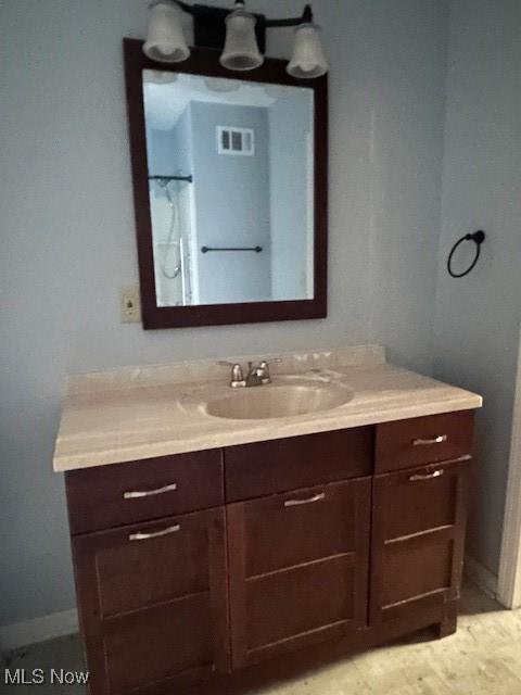 175 Curtis Dr, Avon Lake, OH 44012 - bathroom featuring vanity and baseboards