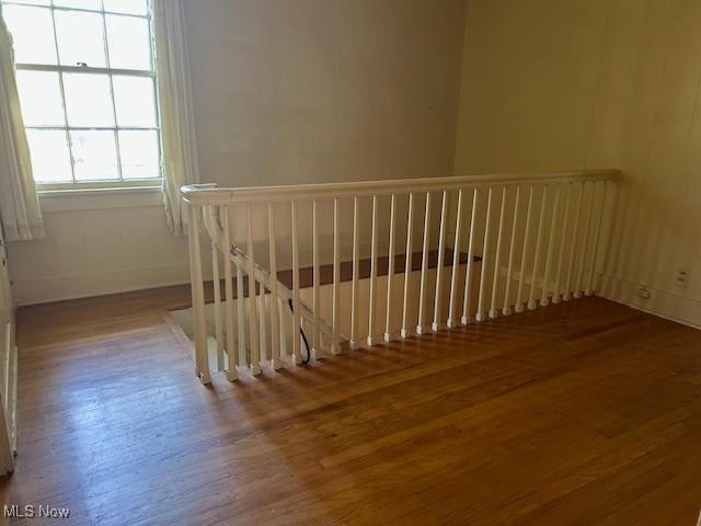 175 Curtis Dr, Avon Lake, OH 44012 - stairs with wood finished floors and baseboards
