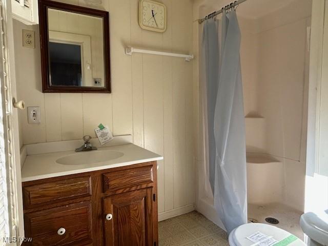 175 Curtis Dr, Avon Lake, OH 44012 - full bathroom featuring vanity, a shower stall, and tile patterned floors