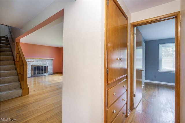 8298 Walter St NW, Massillon, OH 44646 - hall featuring stairs and light wood-style floors