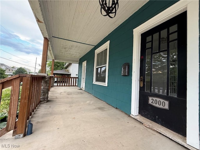 2000 16th St, Parkersburg, WV 26101 - porch featuring an attached carport