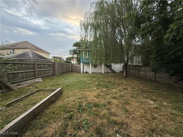 2000 16th St, Parkersburg, WV 26101 - fenced backyard with a vegetable garden