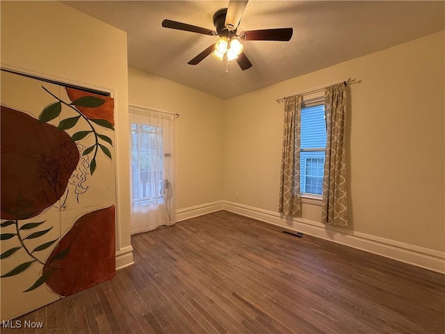 2000 16th St, Parkersburg, WV 26101 - empty room featuring dark wood finished floors, ceiling fan, and a textured ceiling