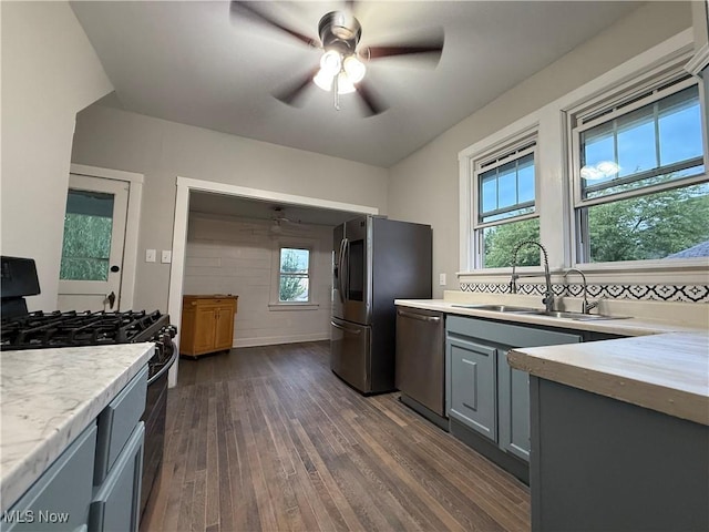 2000 16th St, Parkersburg, WV 26101 - kitchen featuring appliances with stainless steel finishes, ceiling fan, dark wood-type flooring, and light countertops