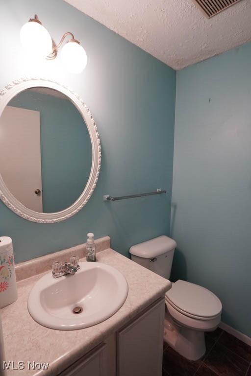 3888 Lake Run Blvd, Stow, OH 44224 - bathroom featuring vanity, a textured ceiling, and tile patterned flooring