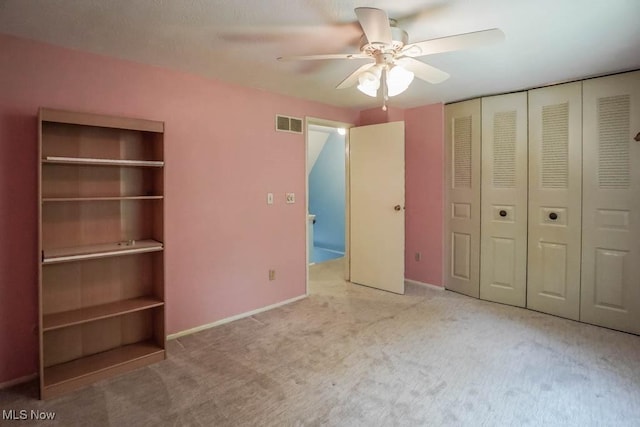 3888 Lake Run Blvd, Stow, OH 44224 - unfurnished bedroom featuring carpet flooring, ceiling fan, and a closet