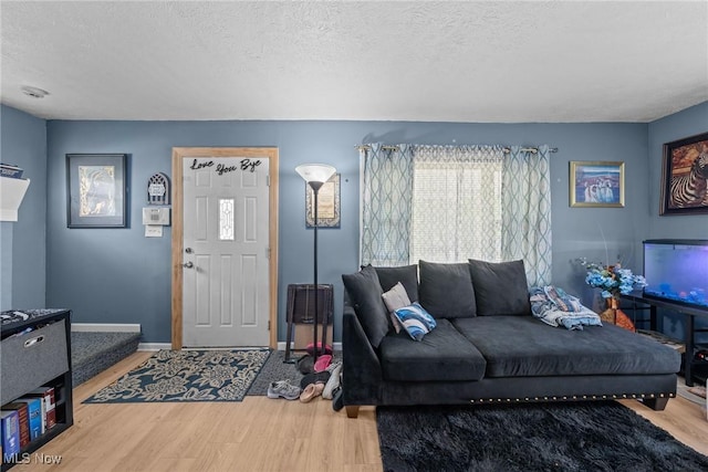 782 Ardella Ave, Akron, OH 44306 - living room with wood finished floors and a textured ceiling