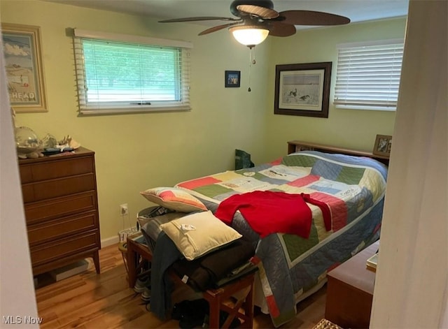 3590 Allendale Ave, Austintown, OH 44511 - bedroom with wood finished floors and ceiling fan