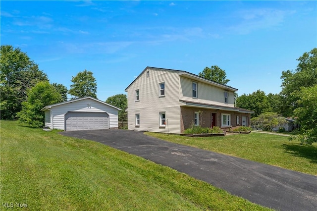 6414 Elk Rd, Canfield, OH 44406 - view of front of property with an outbuilding, a detached garage, and a front yard