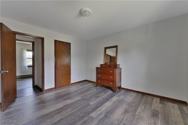 6414 Elk Rd, Canfield, OH 44406 - bedroom with wood finished floors and a closet