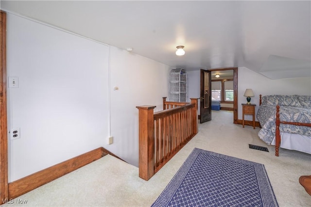 312 S Cleveland Ave, Mogadore, OH 44260 - corridor featuring an upstairs landing, carpet flooring, and vaulted ceiling