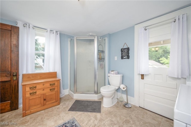 312 S Cleveland Ave, Mogadore, OH 44260 - bathroom with a stall shower and toilet