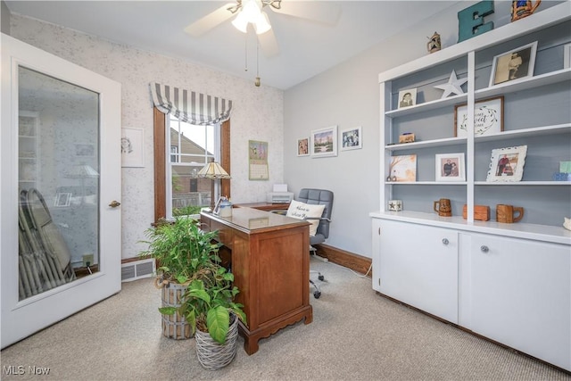 312 S Cleveland Ave, Mogadore, OH 44260 - home office with a ceiling fan, wallpapered walls, and light colored carpet