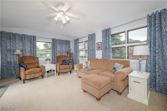 312 S Cleveland Ave, Mogadore, OH 44260 - living area featuring light colored carpet, lofted ceiling, and a ceiling fan