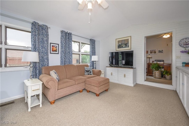 312 S Cleveland Ave, Mogadore, OH 44260 - living room with ceiling fan, lofted ceiling, and carpet