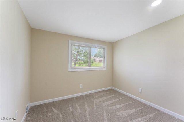 2413 W Manor Ave, Struthers, OH 44514 - carpeted empty room with baseboards