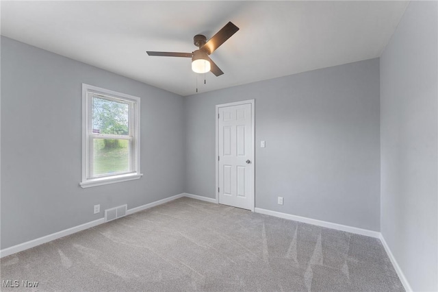 2413 W Manor Ave, Struthers, OH 44514 - carpeted empty room with a ceiling fan and baseboards