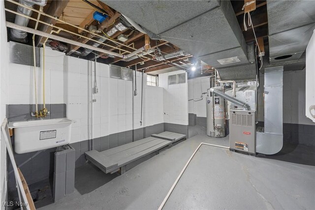 2413 W Manor Ave, Struthers, OH 44514 - basement featuring gas water heater and heating unit