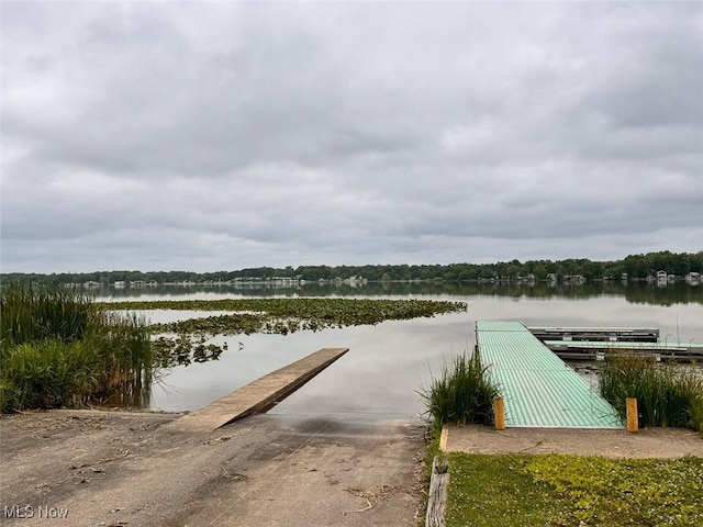 1587 Hilda St, Lakemore, OH 44250 - dock area featuring a boat ramp and a water view