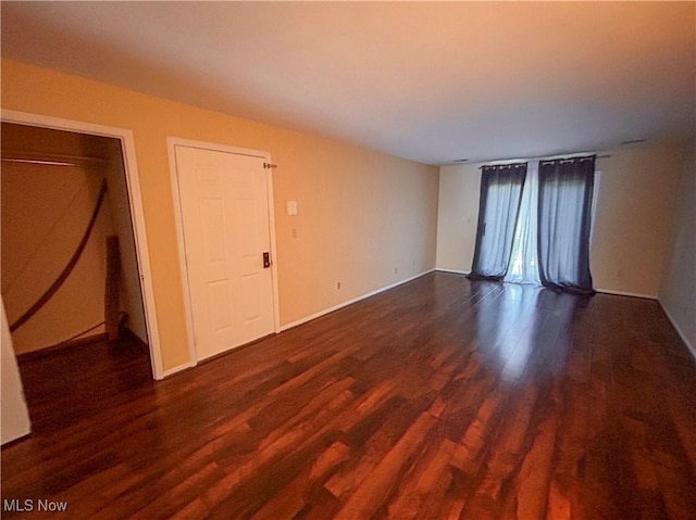 931 Pearson Cir Unit 3, Boardman, OH 44512 - unfurnished room with dark wood finished floors and baseboards