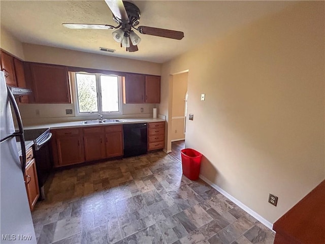 931 Pearson Cir Unit 3, Boardman, OH 44512 - kitchen featuring black dishwasher, ceiling fan, light countertops, and stone finish floors