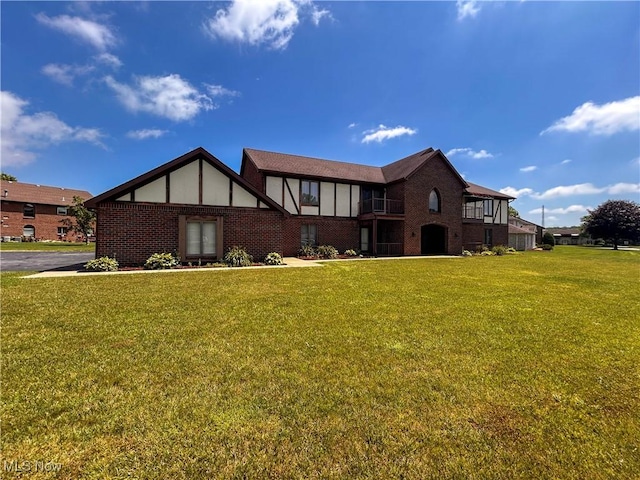 931 Pearson Cir Unit 3, Boardman, OH 44512 - view of front of property with a front yard and brick siding