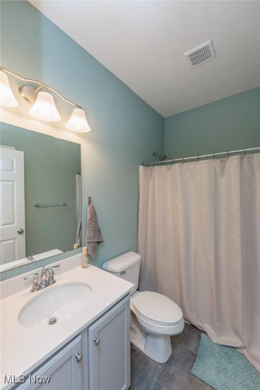 3508 Boos Rd, Huron, OH 44839 - full bathroom featuring vanity and wood finished floors