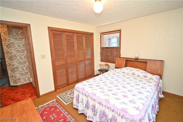 5735 Herbert Rd, Canfield, OH 44406 - carpeted bedroom with a closet and a textured ceiling