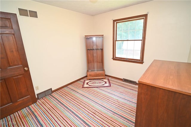 5735 Herbert Rd, Canfield, OH 44406 - unfurnished bedroom featuring carpet floors and baseboards